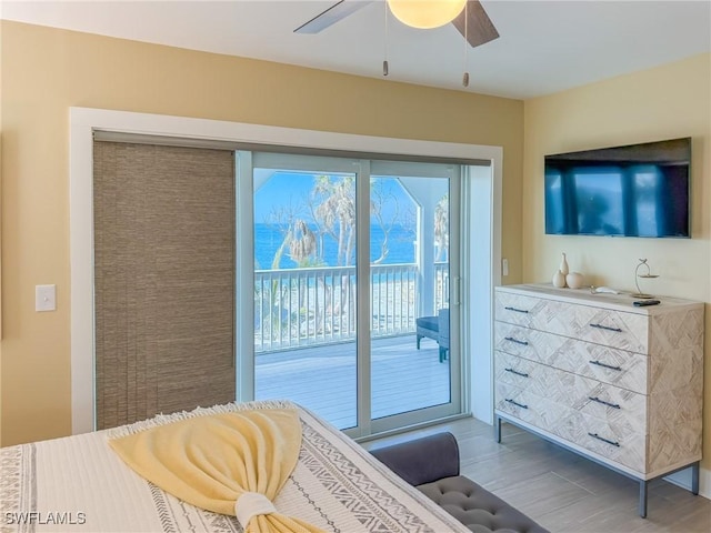 4611 Seair Ln, Upper Captiva, FL 33924 - bedroom with hardwood / wood-style flooring, access to outside, and ceiling fan