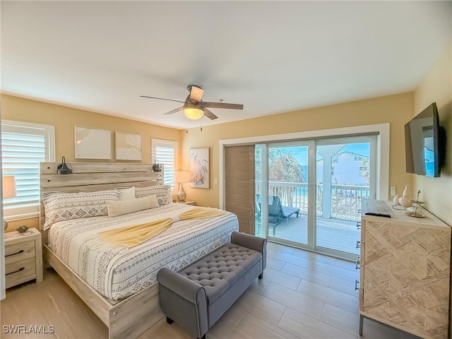 4611 Seair Ln, Upper Captiva, FL 33924 - bedroom with ceiling fan and access to outside