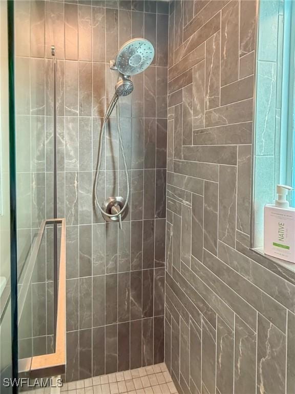 4611 Seair Ln, Upper Captiva, FL 33924 - bathroom featuring a tile shower