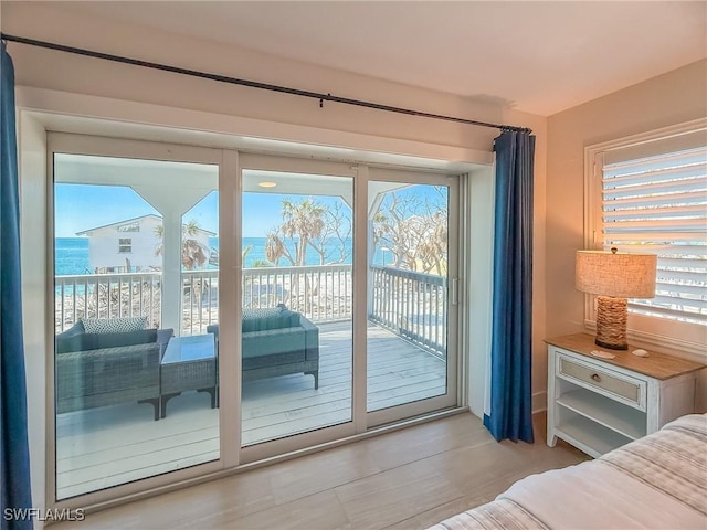 4611 Seair Ln, Upper Captiva, FL 33924 - doorway with plenty of natural light and a water view