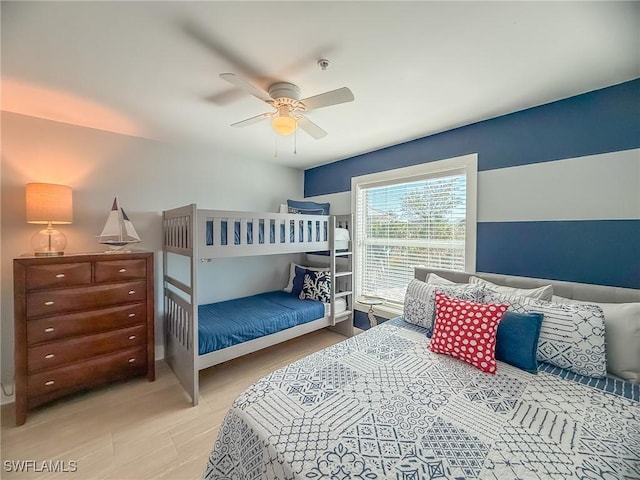 4611 Seair Ln, Upper Captiva, FL 33924 - bedroom with light hardwood / wood-style floors and ceiling fan
