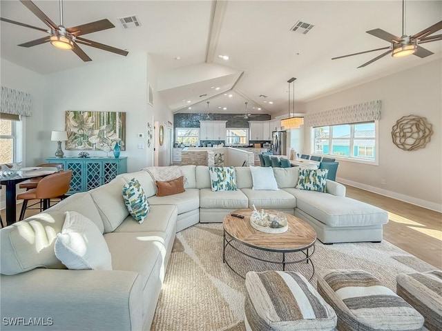 4611 Seair Ln, Upper Captiva, FL 33924 - living room featuring plenty of natural light, ceiling fan, and light hardwood / wood-style flooring