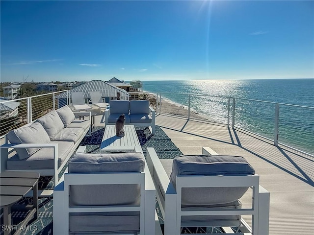 4611 Seair Ln, Upper Captiva, FL 33924 - view of patio / terrace featuring a view of the beach, outdoor lounge area, a balcony, and a water view
