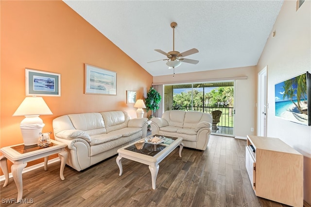 living area with dark wood-style flooring, a ceiling fan, a textured ceiling, high vaulted ceiling, and baseboards