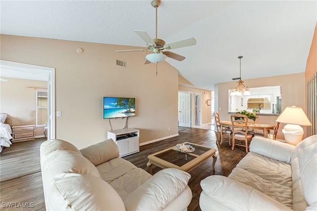 living area with visible vents, wood finished floors, high vaulted ceiling, baseboards, and ceiling fan with notable chandelier