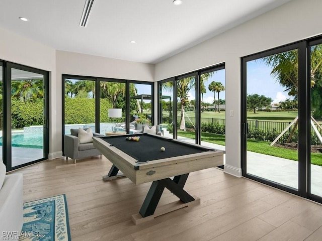 game room featuring pool table and light hardwood / wood-style floors