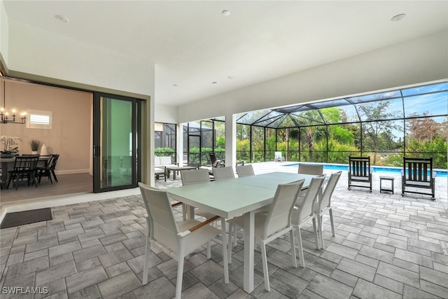 view of patio / terrace with glass enclosure