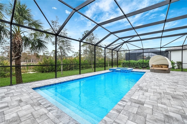 view of swimming pool with a yard, a lanai, a patio, and an in ground hot tub