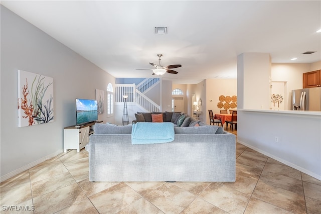 living room featuring ceiling fan