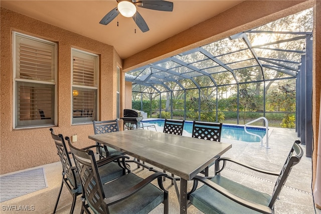 view of patio / terrace with a lanai and ceiling fan