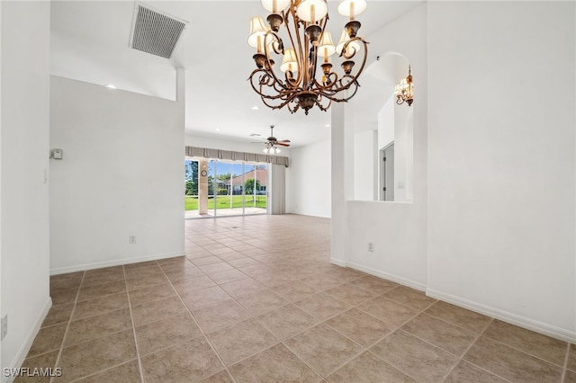 empty room with light tile patterned floors, recessed lighting, visible vents, baseboards, and ceiling fan with notable chandelier