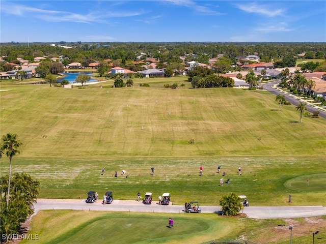 birds eye view of property with golf course view