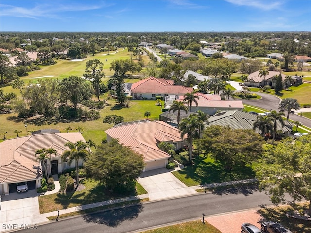 aerial view with a residential view and golf course view