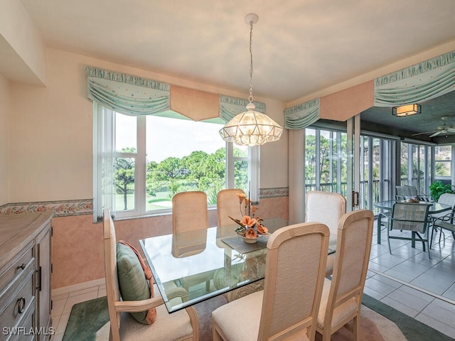 tiled dining room featuring a wealth of natural light