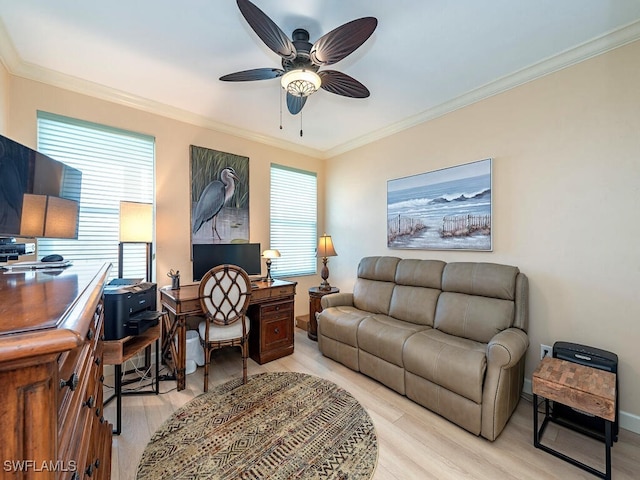 office area featuring crown molding, light hardwood / wood-style flooring, and ceiling fan