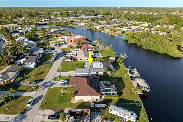 drone / aerial view featuring a water view