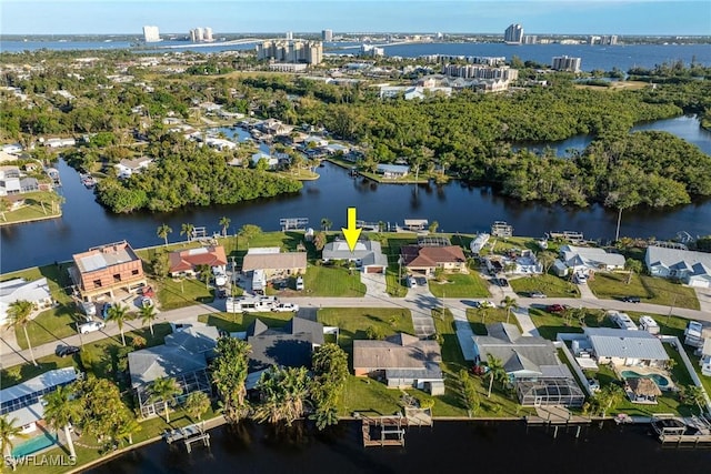 bird's eye view with a water view