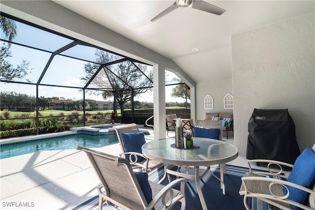 view of pool featuring an in ground hot tub, area for grilling, a lanai, and a patio area