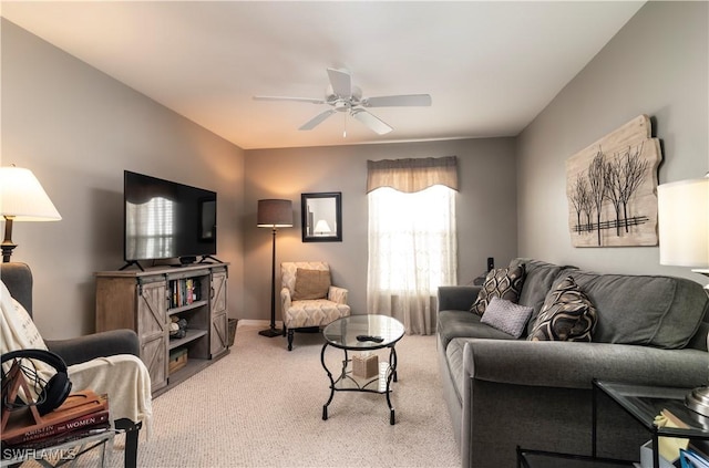 living room featuring ceiling fan and carpet floors