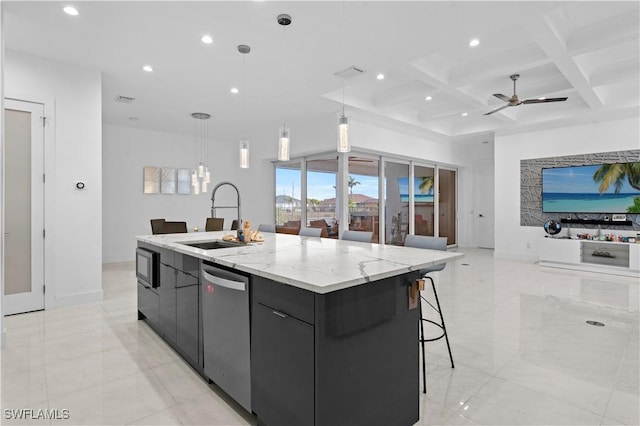 kitchen featuring dishwasher, sink, a large island, and pendant lighting