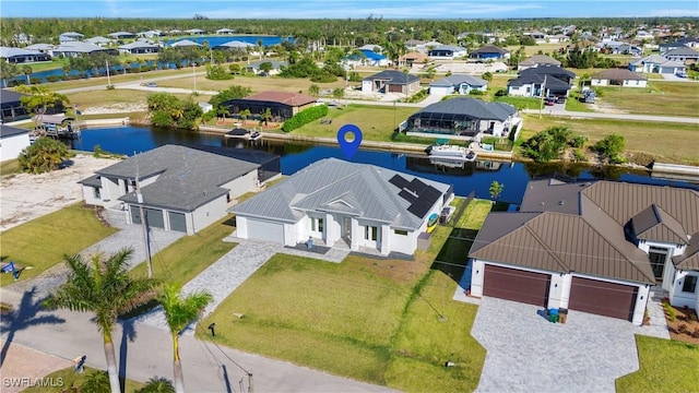 bird's eye view with a water view