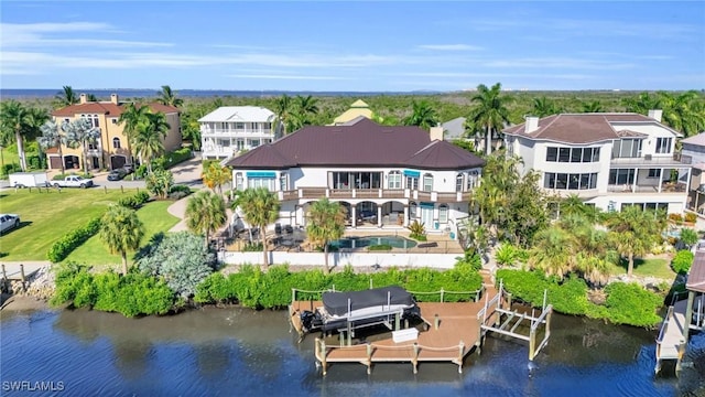 bird's eye view with a water view