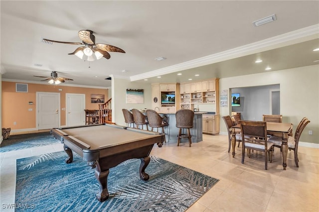 playroom with light tile patterned flooring, pool table, ornamental molding, and ceiling fan