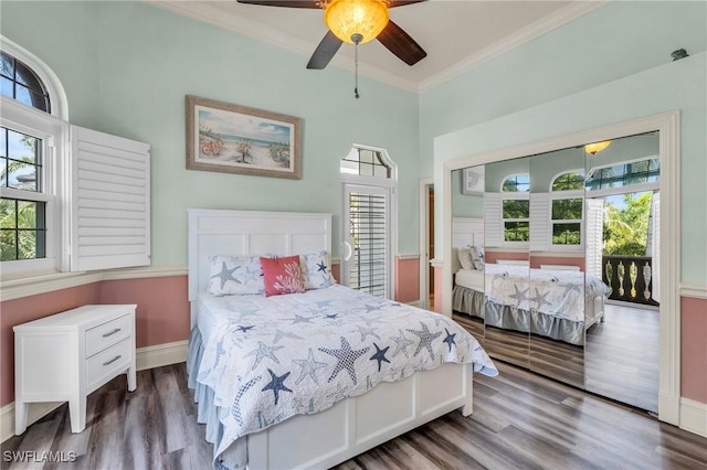 bedroom featuring ornamental molding, hardwood / wood-style floors, access to exterior, and ceiling fan