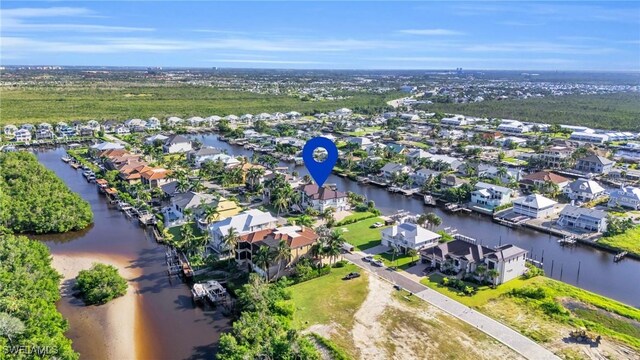 drone / aerial view featuring a water view