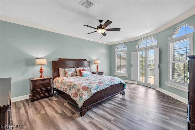 bedroom featuring ornamental molding, hardwood / wood-style floors, access to exterior, and ceiling fan