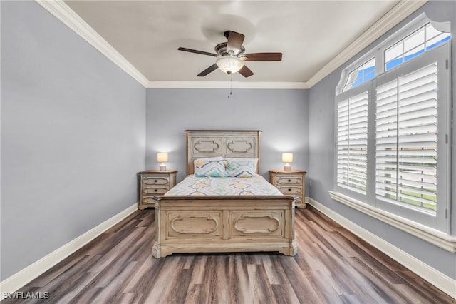 bedroom featuring crown molding, ceiling fan, dark hardwood / wood-style floors, and multiple windows