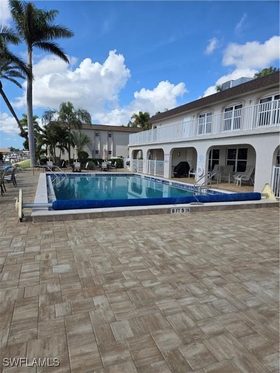 view of pool with a patio