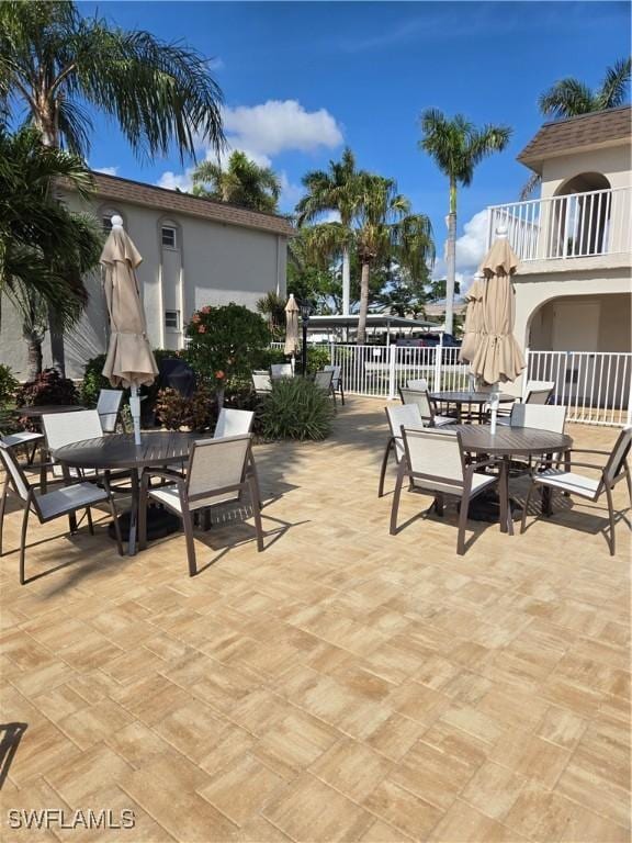 view of patio / terrace with a balcony