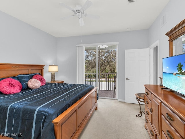 carpeted bedroom with access to exterior and ceiling fan