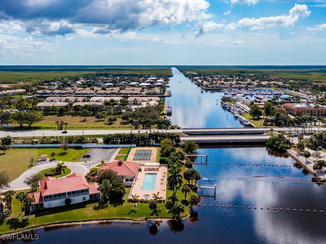 drone / aerial view with a water view