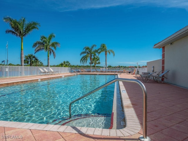 view of swimming pool featuring a patio