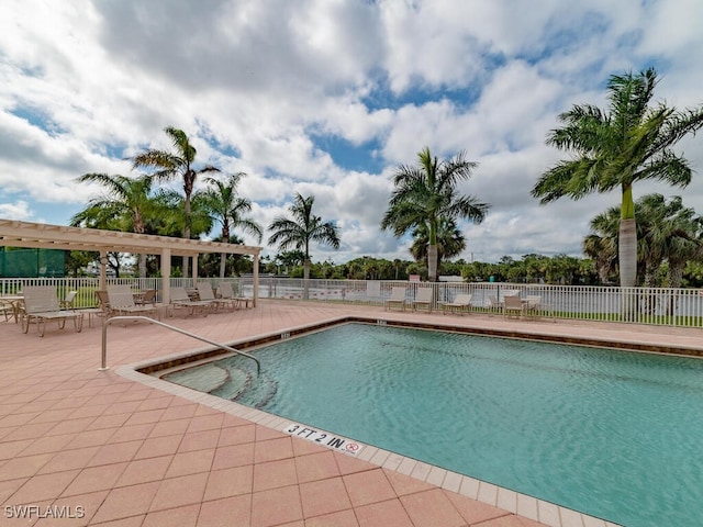 view of pool featuring a patio