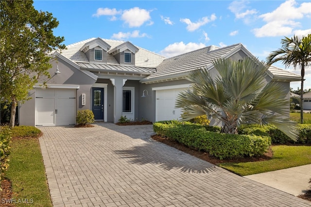 view of front of home with a garage