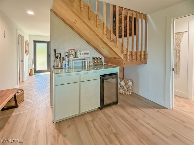 kitchen featuring light parquet floors and wine cooler