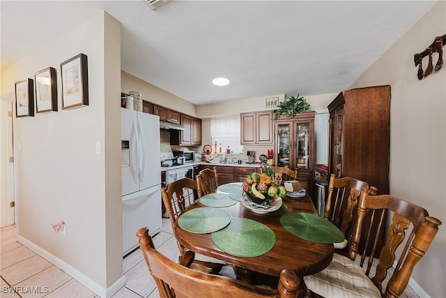 view of tiled dining space