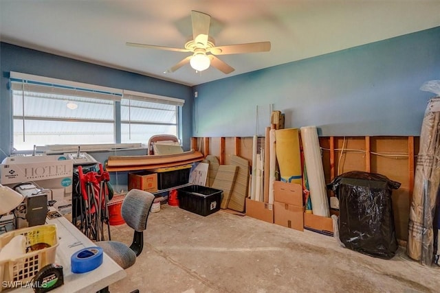 interior space with concrete floors and ceiling fan