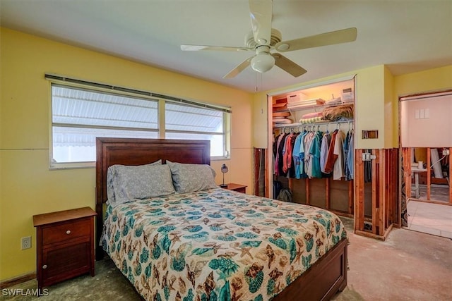 bedroom featuring ceiling fan and a closet