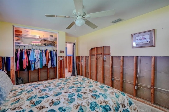 bedroom featuring ceiling fan and a closet