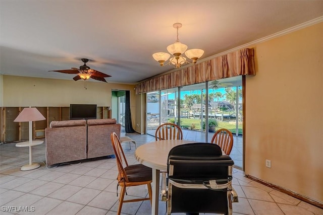 dining area with light tile patterned flooring, crown molding, and ceiling fan with notable chandelier