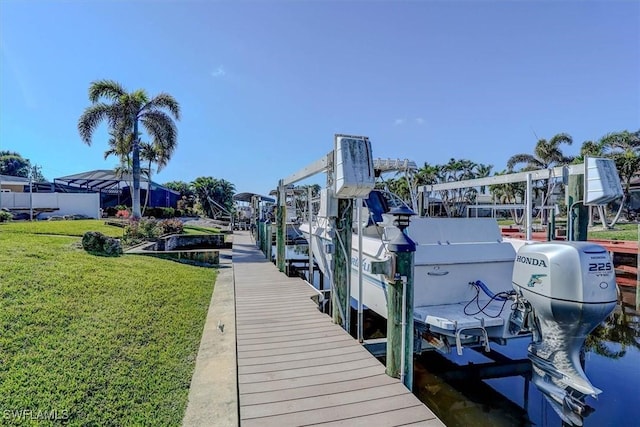 dock area featuring a yard and a water view