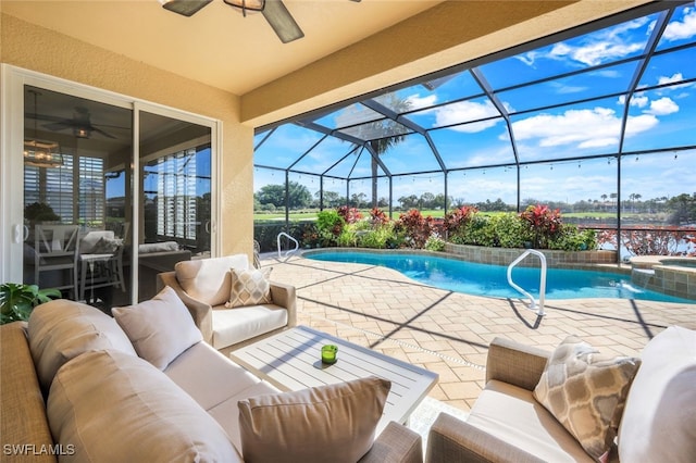 view of swimming pool featuring pool water feature, an outdoor living space, a lanai, and a patio