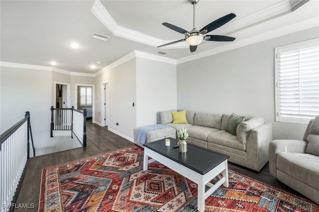 living area with ornamental molding, recessed lighting, a ceiling fan, visible vents, and wood finished floors