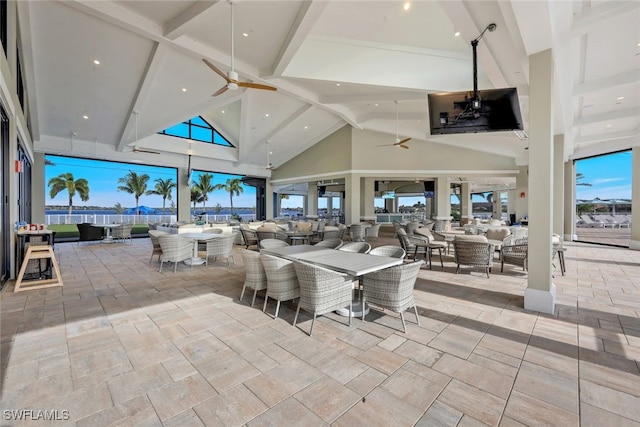 view of patio with outdoor dining space, a gazebo, and a ceiling fan