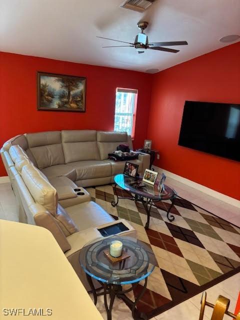 living room with ceiling fan