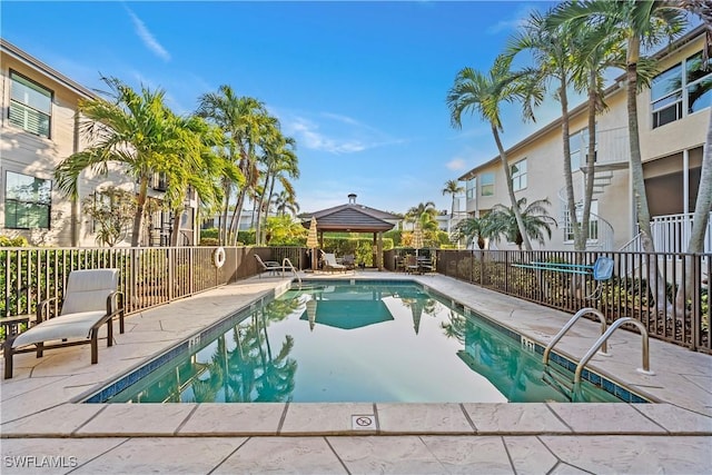 view of swimming pool with a gazebo